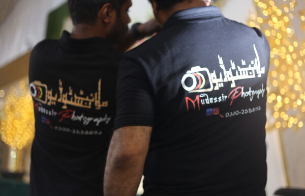 Moon Light Studio Photographer in Karachi Moon Light Studio photographer in branded shirt working behind the scenes at photography shoot in Karachi Gallery 1